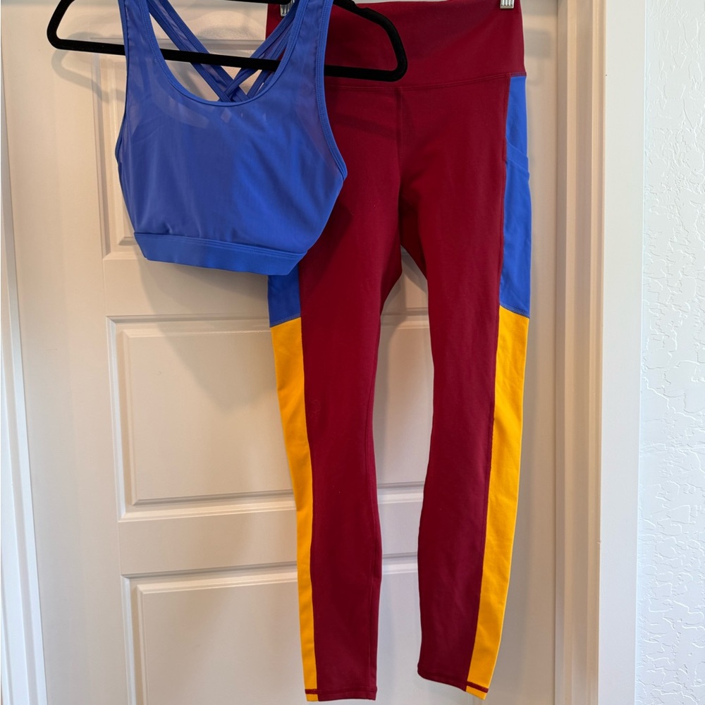 Fabletics Blue and Red Leggings with Yellow Accents